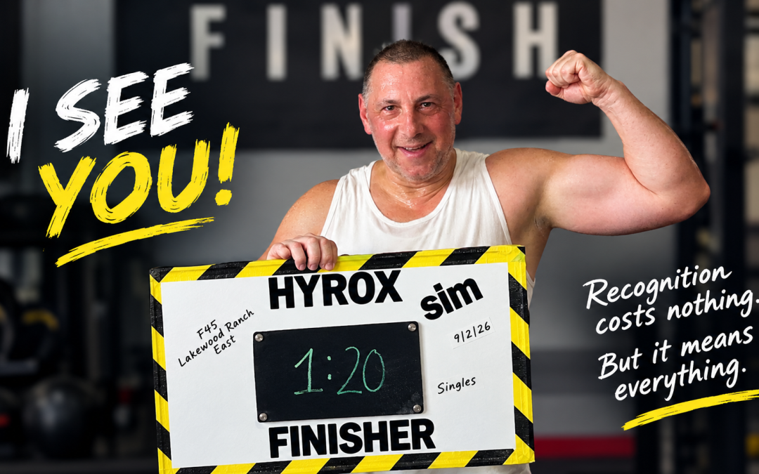 HYROX finisher celebrating after a challenging fitness workout